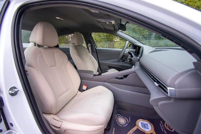 Used Hyundai Elantra VII (CN7) Facelift, 1.6 l, 2023 in Sharjah by First Choice Cars, White color. GCC Specs | AUTO.AE