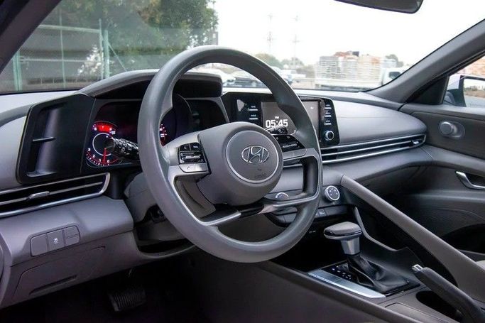 Used Hyundai Elantra VII (CN7) Facelift, 1.6 l, 2023 in Sharjah by First Choice Cars, White color. GCC Specs | AUTO.AE