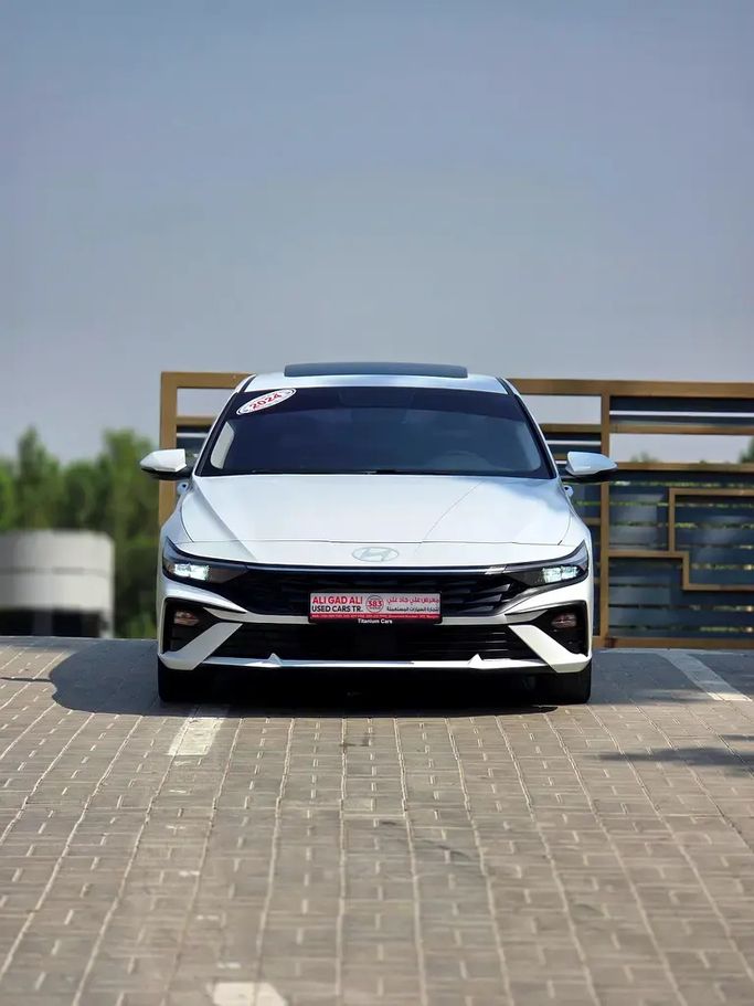 Used ⁦Hyundai Elantra VII (CN7) Facelift, 1.6 l, 2024⁩ in UAE, Sharjah by Ali Gad Ali Used Cars, White color. Chinese Specs | AUTO.AE | Listing #291001
