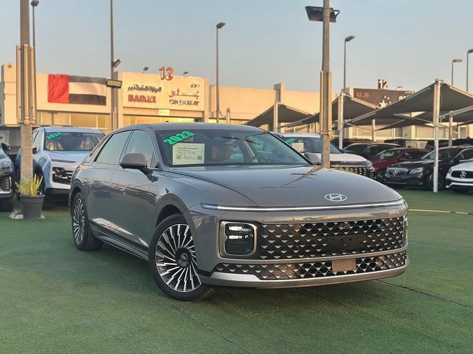 Used Hyundai Grandeur VII, 2.5 l, 2023 in Sharjah by Badar Used Cars, Grey color.  | AUTO.AE