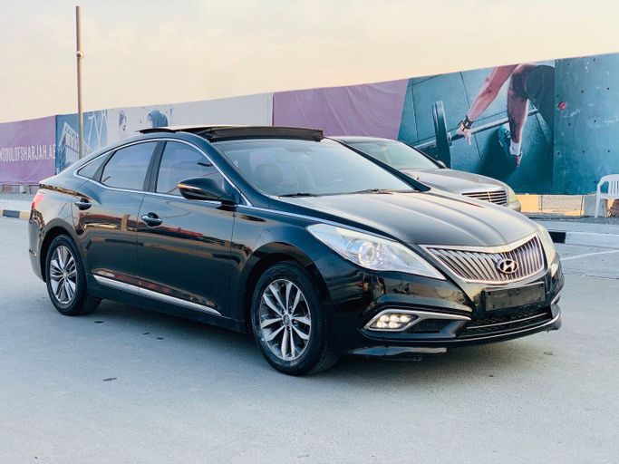 Подержанный Hyundai Grandeur V, 2.4 л, 2014 в Шардже от AL Irfan  Used cars Черный цвет. Корейская | AUTO.AE