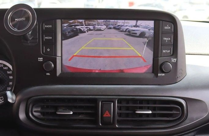Подержанный Hyundai i10 III Рестайлинг, 1.2 л, 2023 в Шардже от Al Sayed Khamis Used Cars Красный цвет. GCC | AUTO.AE
