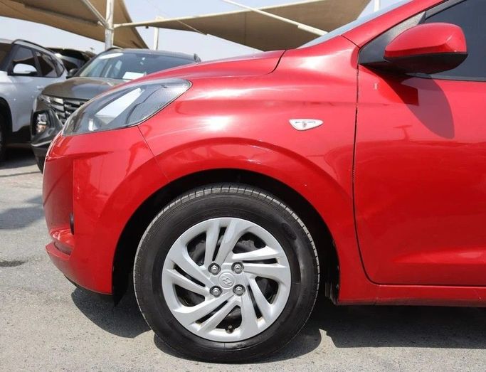 Подержанный Hyundai i10 III Рестайлинг, 1.2 л, 2023 в Шардже от Al Sayed Khamis Used Cars Красный цвет. GCC | AUTO.AE