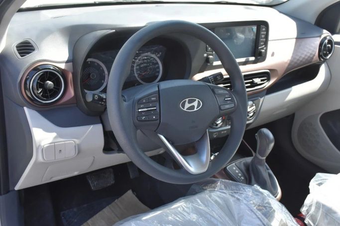Новый Hyundai i10 III Рестайлинг, 1.0 л, 2024 в Шардже от Alfaris Used Cars Серебристый цвет. GCC | AUTO.AE