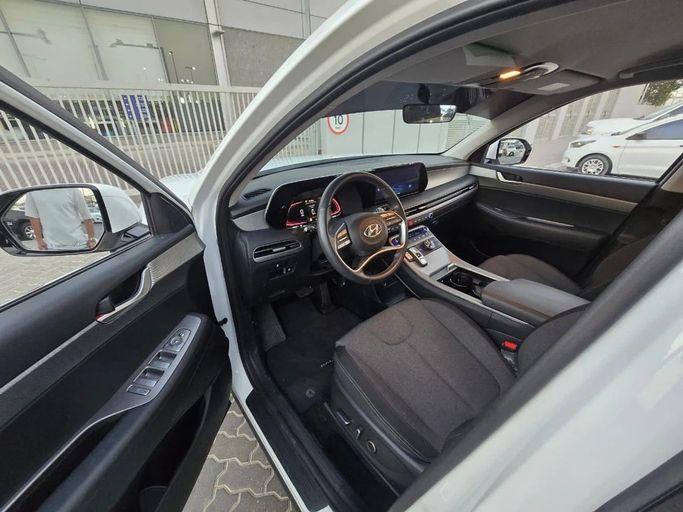 Подержанный Hyundai Palisade I Рестайлинг, 3.5 л, 2024 в Шардже от Al Jana Used Cars Белый цвет. GCC | AUTO.AE