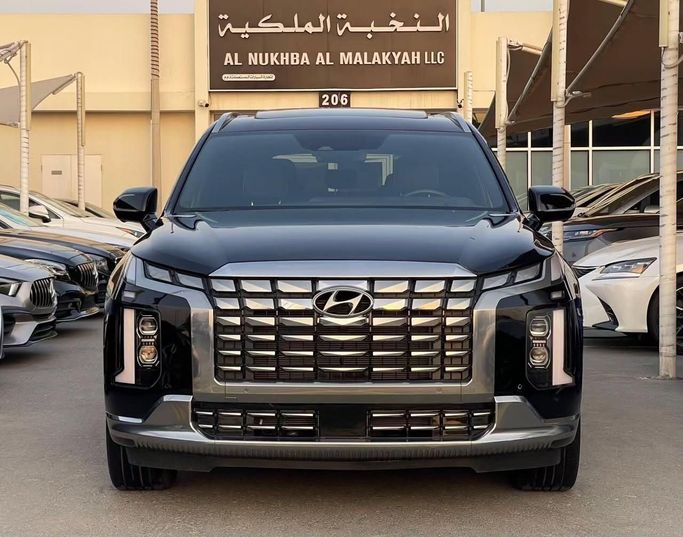 Подержанный Hyundai Palisade I Рестайлинг, 3.8 л, 2023 в Шардже от Al Nukhba Al Malakyah Used Cars Черный цвет. Американская | AUTO.AE