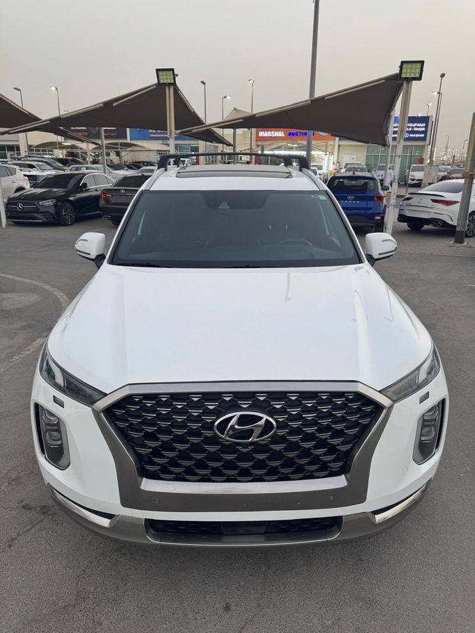 Подержанный Hyundai Palisade I, 3.8 л, 2022 в Шардже от Daira Used Cars Белый цвет. Американская | AUTO.AE