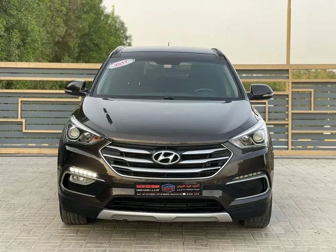 Подержанный Hyundai Santa Fe III Рестайлинг, 2.4 л, 2017 в Шардже от Al Sayed Ezzat Khamis Черный цвет. GCC | AUTO.AE