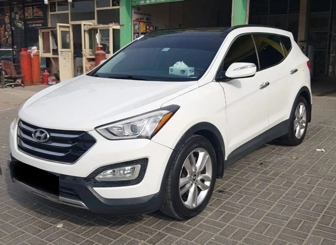 Подержанный Hyundai Santa Fe III, 2.4 л, 2015 в Шардже от Titanium Used Cars Белый цвет. Американская | AUTO.AE