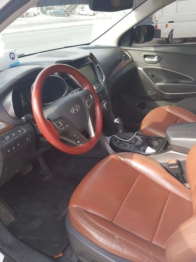 Подержанный Hyundai Santa Fe III, 2.4 л, 2015 в Шардже от Titanium Used Cars Белый цвет. Американская | AUTO.AE