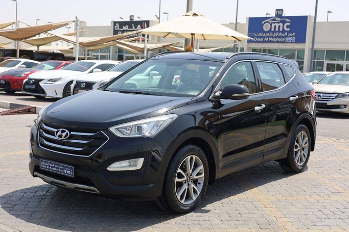 Подержанный Hyundai Santa Fe III, 3.3 л, 2015 в Шардже от OMC Used Cars Черный цвет. GCC | AUTO.AE