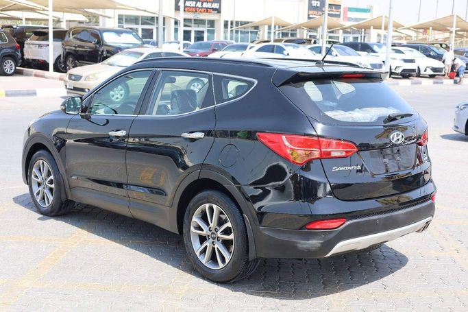 Подержанный Hyundai Santa Fe III, 3.3 л, 2015 в Шардже от OMC Used Cars Черный цвет. GCC | AUTO.AE