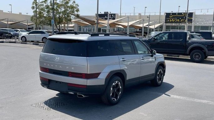 Подержанный Hyundai Santa Fe V (MX5), 2.5 л, 2024 в Шардже от Halla Cars Серебристый цвет. Американская | AUTO.AE