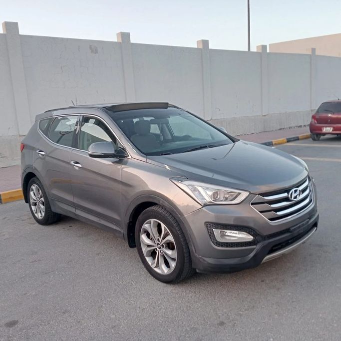 Подержанный Hyundai Santa Fe III, 3.3 л, 2016 в ОАЭ, Шарджа от Laqtah Used Cars Серый цвет. GCC | AUTO.AE | Объявление #272772