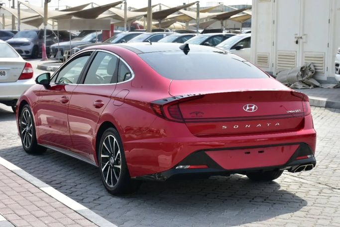 Подержанный Hyundai Sonata VIII (DN8), 1.6 л, 2023 в Шардже от Alfaris Used Cars Красный цвет. Other | AUTO.AE