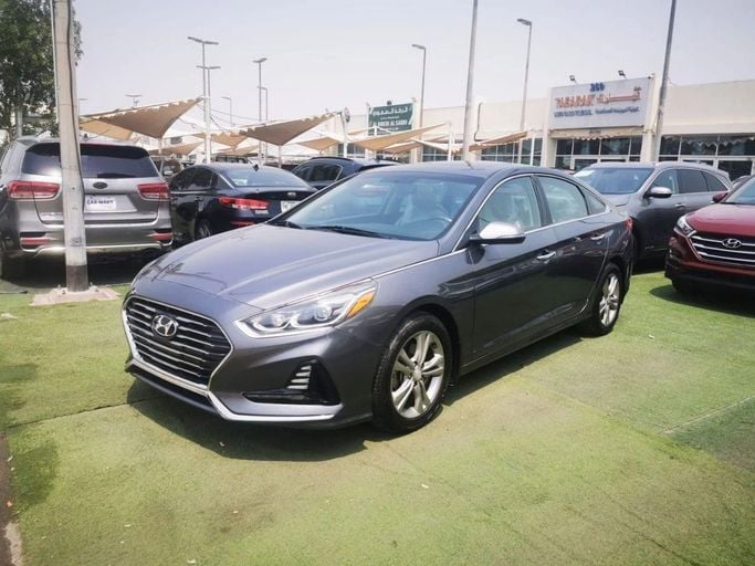 Подержанный Hyundai Sonata VII (LF) Рестайлинг, 2.4 л, 2018 в Шардже от Tabarak Used Cars Серый цвет. Американская | AUTO.AE