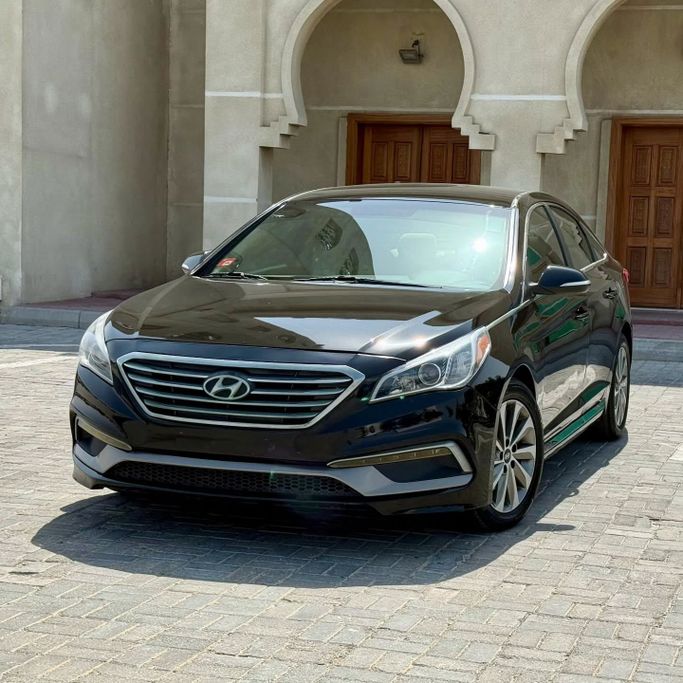 Подержанный Hyundai Sonata VII (LF), 2.4 л, 2016 в Шардже от Sarmad Cars Черный цвет. Американская | AUTO.AE