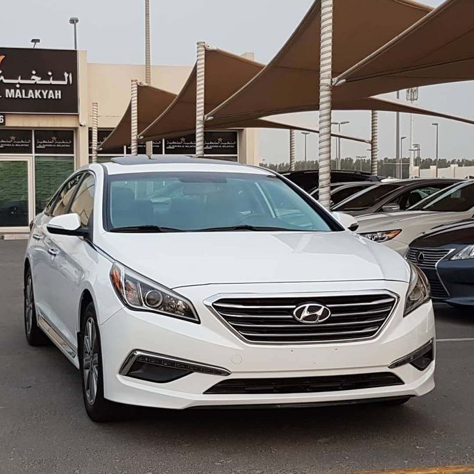 Used Hyundai Sonata VII (LF), 2.4 l, 2016 in Sharjah by Al Nukhba Al Malakyah Used Cars, White color. American Specs | AUTO.AE