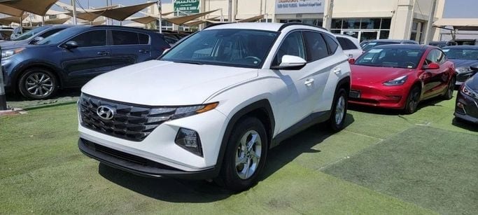 Подержанный Hyundai Tucson IV, 2.5 л, 2022 в Шардже от Tabarak Used Cars Белый цвет. Американская | AUTO.AE
