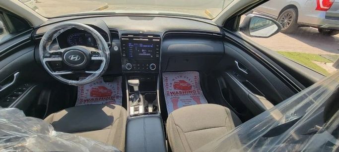 Подержанный Hyundai Tucson IV, 2.5 л, 2022 в Шардже от Tabarak Used Cars Белый цвет. Американская | AUTO.AE