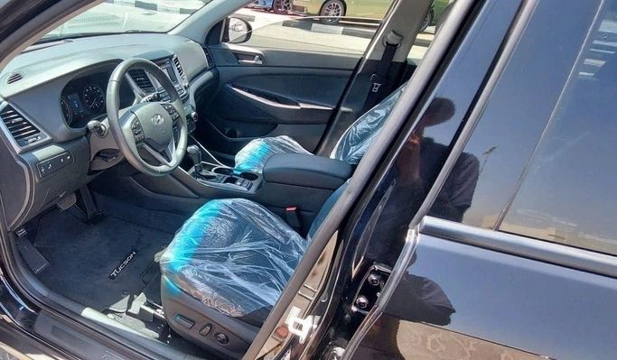 Used Hyundai Tucson III, 1.6 l, 2017 in Sharjah by Tabarak Used Cars, Black color. American Specs | AUTO.AE