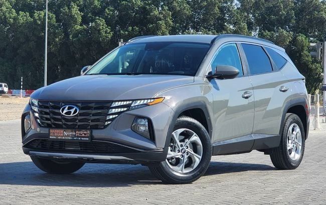 Подержанный Hyundai Tucson IV, 2.5 л, 2024 в Шардже от Nassem Al Sham Used Cars Серый цвет. Американская | AUTO.AE