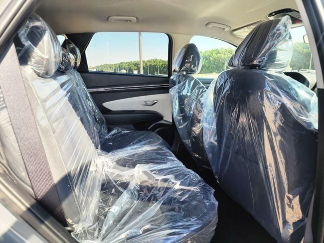 Подержанный Hyundai Tucson IV, 2.5 л, 2024 в Шардже от Nassem Al Sham Used Cars Серый цвет. Американская | AUTO.AE