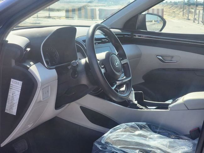 Подержанный Hyundai Tucson IV, 2.5 л, 2024 в Шардже от Nassem Al Sham Used Cars Серый цвет. Американская | AUTO.AE