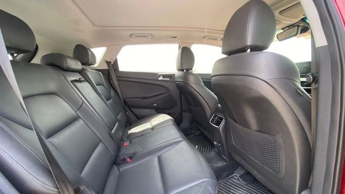 Used Hyundai Tucson III Facelift, 2.4 l, 2021 in Sharjah by Halla Cars, Red color. American Specs | AUTO.AE