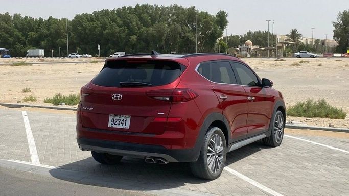 Used Hyundai Tucson III Facelift, 2.4 l, 2021 in Sharjah by Halla Cars, Red color. American Specs | AUTO.AE