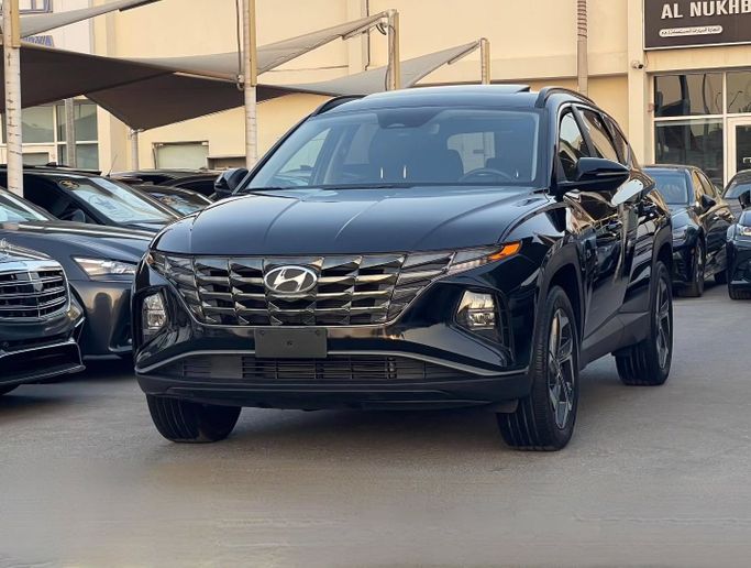 Подержанный Hyundai Tucson IV, 2.5 л, 2023 в Шардже от Al Nukhba Al Malakyah Used Cars Черный цвет. Американская | AUTO.AE