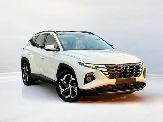 New Hyundai Tucson IV, 1.6 l, 2024 in Sharjah by Al Wisam Al Malaki Used Cars, White color. GCC Specs | AUTO.AE