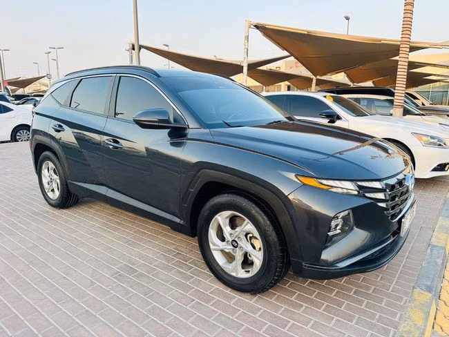 مستعملة ⁦Hyundai Tucson رابعاً، 2.5 l، 2022⁩ في في الإمارات, الشارقة من Titanium Used Cars، اللون أسود. المواصفات الأمريكية | AUTO.AE | إعلان #285159