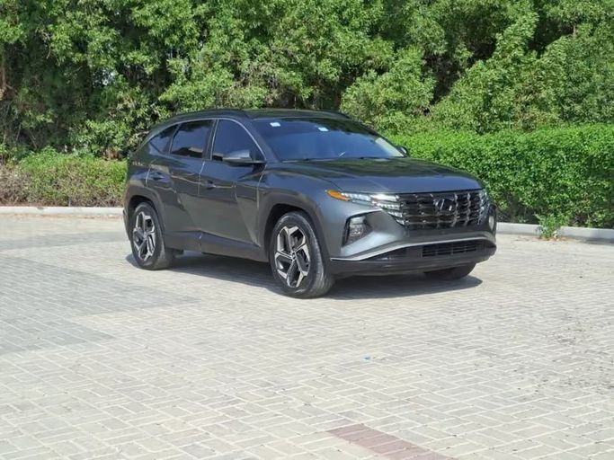 مستعملة ⁦Hyundai Tucson رابعاً، 2.5 l، 2022⁩ في في الإمارات, الشارقة من AL HAMOOR AL THAHABI، اللون رمادي. المواصفات الأمريكية | AUTO.AE | إعلان #290928