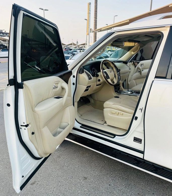 Used Infiniti QX56 II, 5.6 l, 2011 in Sharjah by Titanium Used Cars, White color. GCC Specs | AUTO.AE