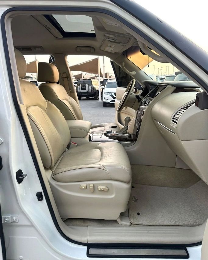 Used Infiniti QX56 II, 5.6 l, 2011 in Sharjah by Titanium Used Cars, White color. GCC Specs | AUTO.AE