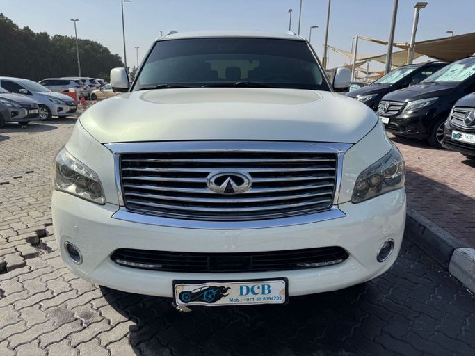 Used Infiniti QX56 II, 5.6 l, 2013 in Sharjah by DCB Cars, White color. GCC Specs | AUTO.AE
