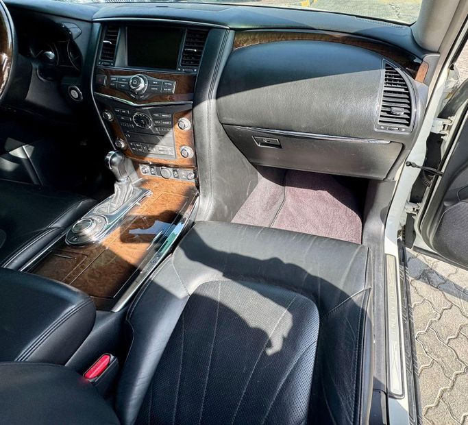 Used Infiniti QX56 II, 5.6 l, 2013 in Sharjah by DCB Cars, White color. GCC Specs | AUTO.AE