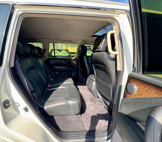 Used Infiniti QX56 II, 5.6 l, 2013 in Sharjah by DCB Cars, White color. GCC Specs | AUTO.AE