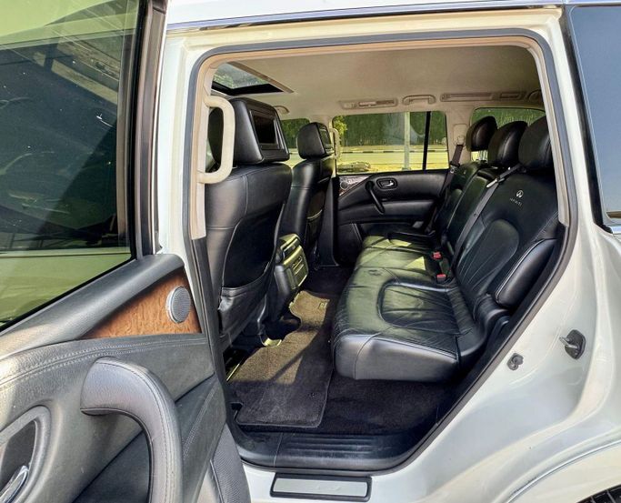 Used Infiniti QX56 II, 5.6 l, 2013 in Sharjah by DCB Cars, White color. GCC Specs | AUTO.AE