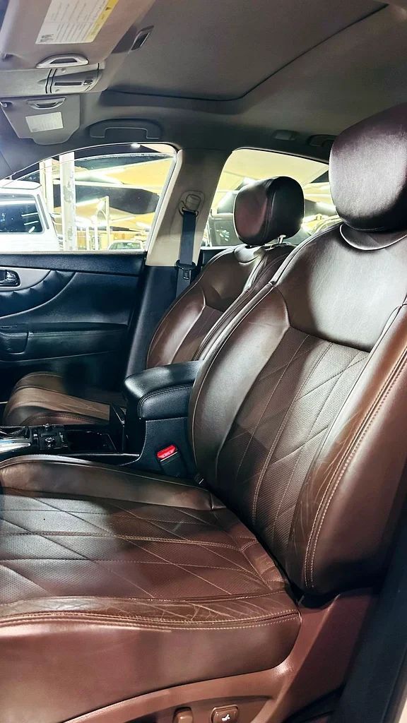 Used Infiniti QX70, 3.7 l, 2015 in Sharjah by Imad Younis Almani used Cars, White color. GCC Specs | AUTO.AE