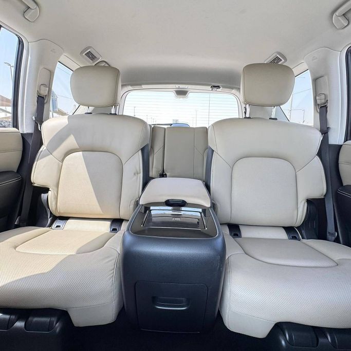 Подержанный Infiniti QX80 I Рестайлинг 3, 5.6 л, 2024 в Шардже от Alfaris Used Cars Белый цвет. Other | AUTO.AE
