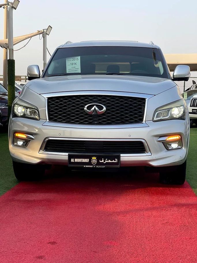 Подержанный Infiniti QX80 I Рестайлинг, 5.6 л, 2015 в Шардже от Al Muhtaref Used Cars Серебристый цвет. GCC | AUTO.AE