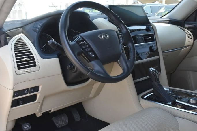 Подержанный Infiniti QX80 I Рестайлинг 3, 5.6 л, 2022 в Шардже от Alfaris Used Cars Синий цвет. Other | AUTO.AE