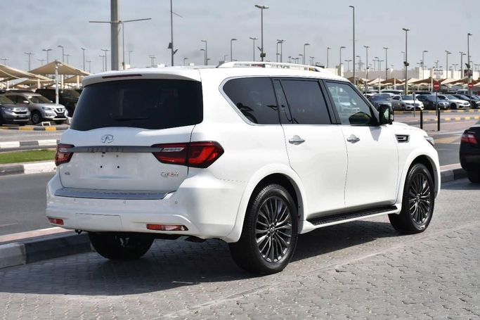 Подержанный Infiniti QX80 I Рестайлинг 3, 5.6 л, 2022 в Шардже от Alfaris Used Cars Белый цвет. Other | AUTO.AE