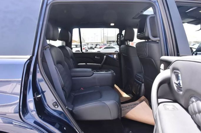 Подержанный Infiniti QX80 I Рестайлинг 3, 5.6 л, 2023 в Шардже от Alfaris Used Cars Синий цвет. Other | AUTO.AE