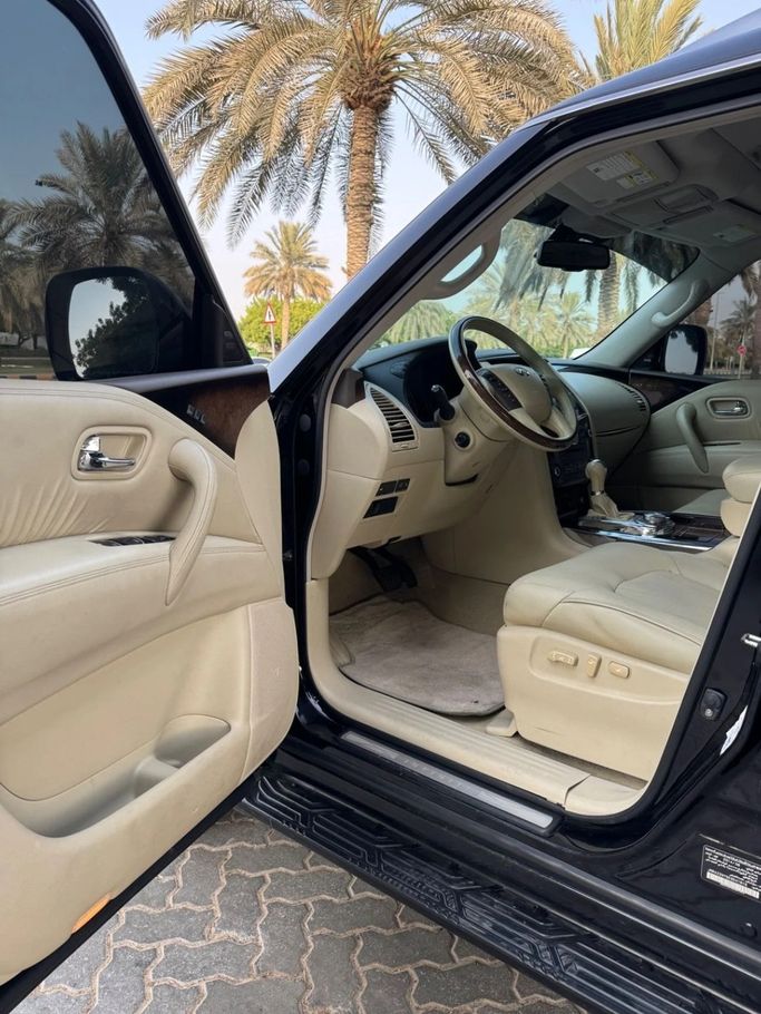 Подержанный Infiniti QX80 I, 5.6 л, 2014 в Шардже от Titanium Used Cars Черный цвет. GCC | AUTO.AE