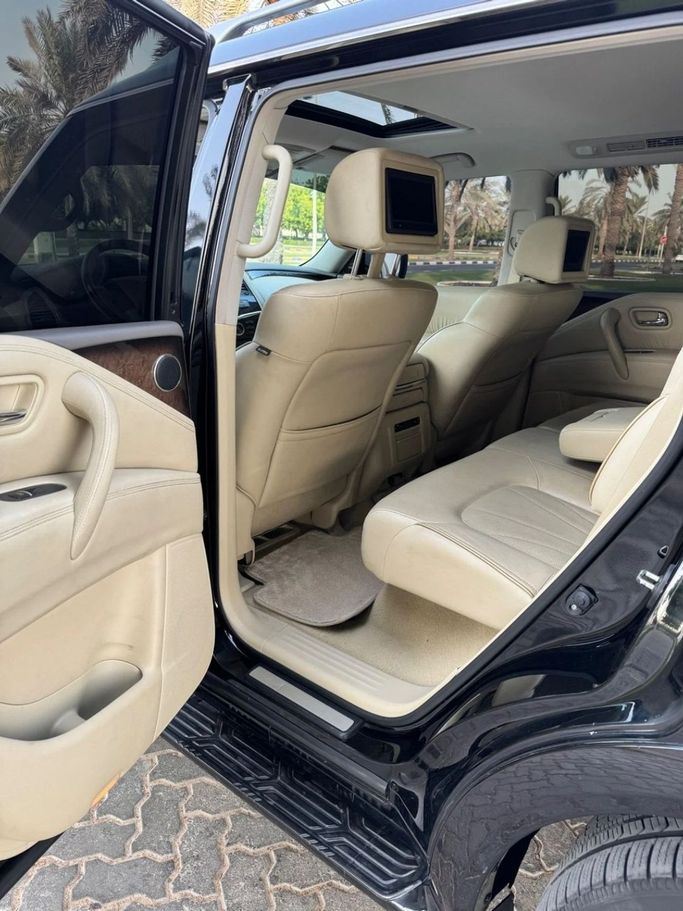 Подержанный Infiniti QX80 I, 5.6 л, 2014 в Шардже от Titanium Used Cars Черный цвет. GCC | AUTO.AE