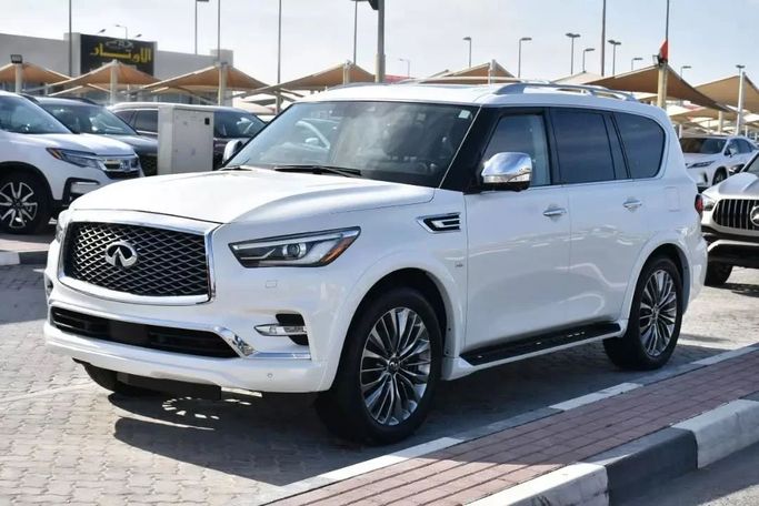 Подержанный Infiniti QX80 I Рестайлинг 2, 5.6 л, 2020 в Шардже от Alfaris Used Cars Белый цвет. Other | AUTO.AE