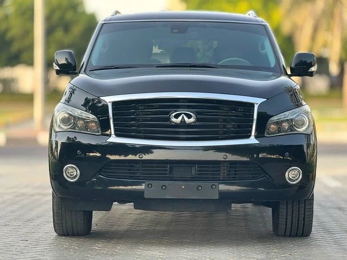 Подержанный Infiniti QX80 I Рестайлинг, 5.6 л, 2014 в Шардже от Taj Al Impratoor Used Cars Черный цвет. GCC | AUTO.AE